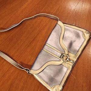 Kate Spade 2 tone mettalic purse! STILL GOT A FEW MILES LEFT!